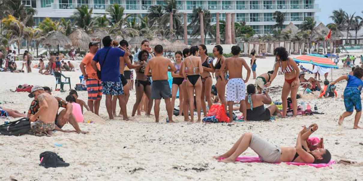 Suman 37 estudiantes vacacionistas que se contagiaron de Covid; llaman a confinarse