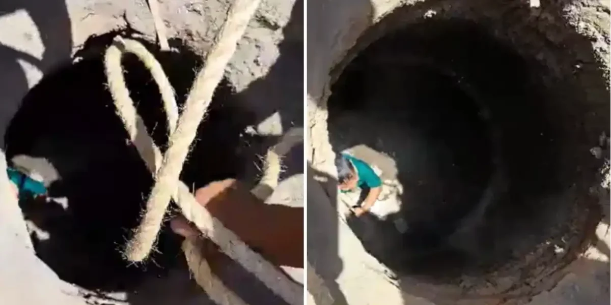 Cae niño en coladera de Puebla, lo rescatan ambulantes (VIDEO)