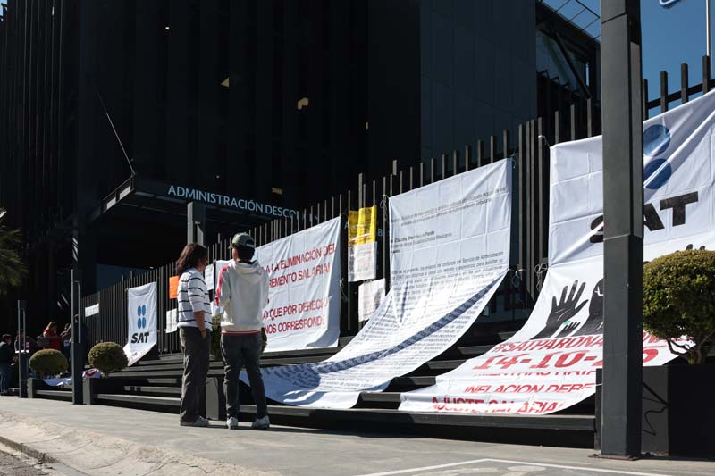 SAT Angelópolis bajo bloqueo de trabajadores por ajuste salarial